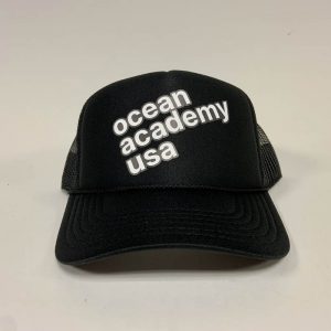 front view of ocean academy text angled on a mesh back foam hat