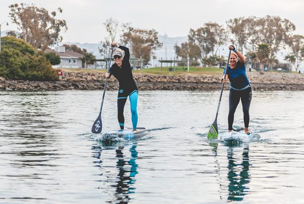 ocean academy candice paddling with student